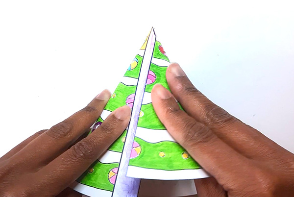 Step 3. Gluing together a paper Christmas Tree.